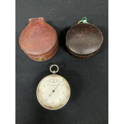 590 - A red leather cased double sided pocket barometer and aleather cased Altimeter by Elliott and Sons, ... 