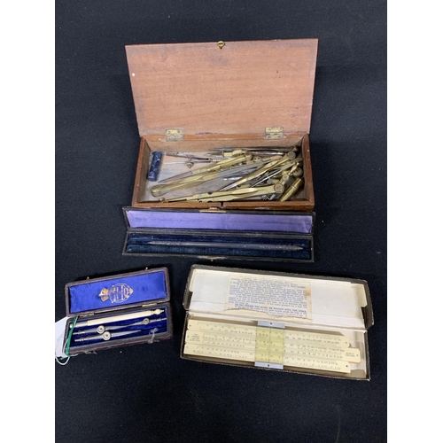 593 - Collection of drawing instruments and slide rule