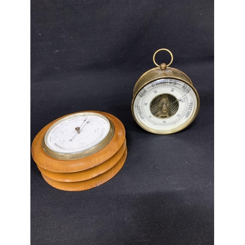 594 - 2 Aneroid barometers, each dial 13cms diameter