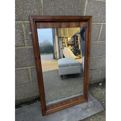 62 - A continental style walnut framed  mirror 65x112