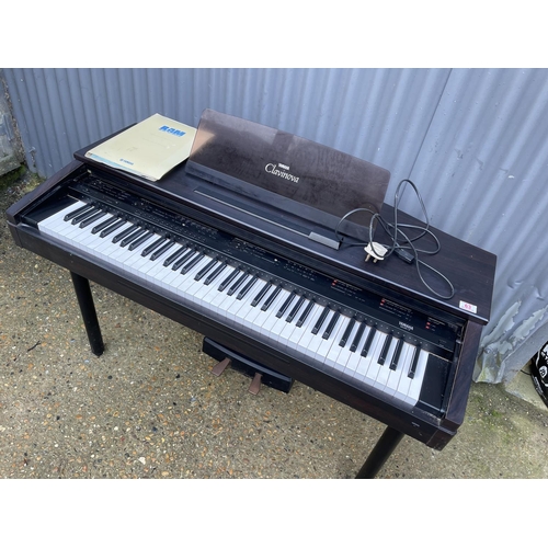 63 - A yamaha clavinova CVP 7 electric piano with instructions