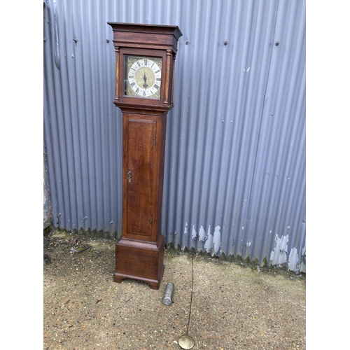 66 - An oak cased lomg case with brass dial by GODEN WEST MALLING