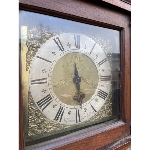 66 - An oak cased lomg case with brass dial by GODEN WEST MALLING