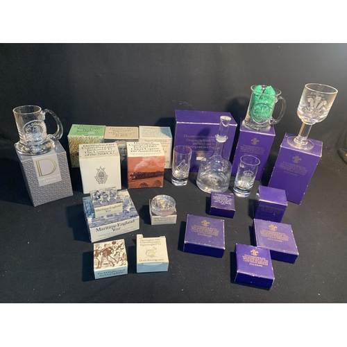 671 - Dartington Glass - Commemorative tankards, Decanter Set and Paperweights, 19 pieces in all