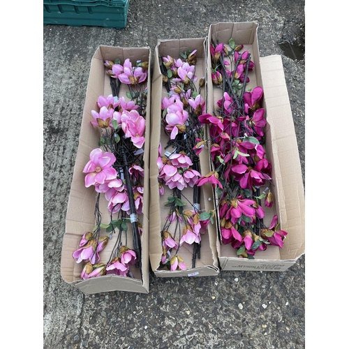 84 - Three boxes of six artificial pink  magnolia stems