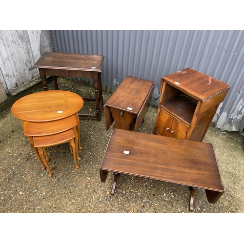 9 - A repro nest of three, coffee table, book table, drop leaf and an oak table