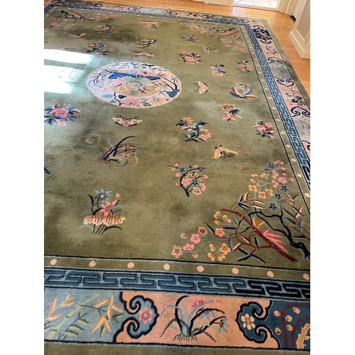 53 - A very large green pattern oriental carpet