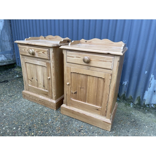 97 - A pair of country pine pot cupboard bedsides