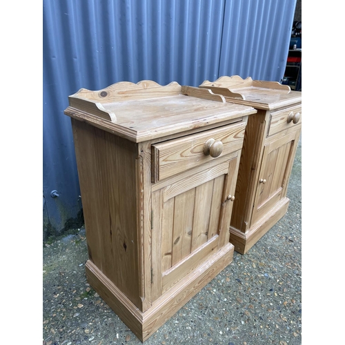 97 - A pair of country pine pot cupboard bedsides