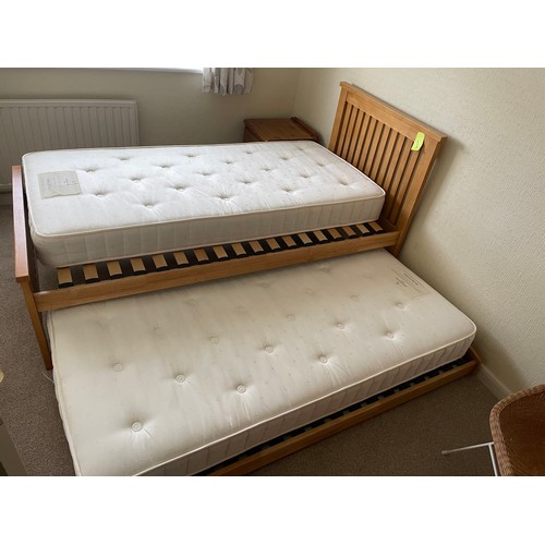 281 - Modern light oak single bed with stowaway guest bed and mattress