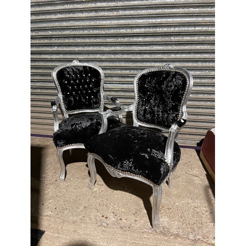 293 - A pair of black crush velvet, silver gilt and diamanté throne style armchairs