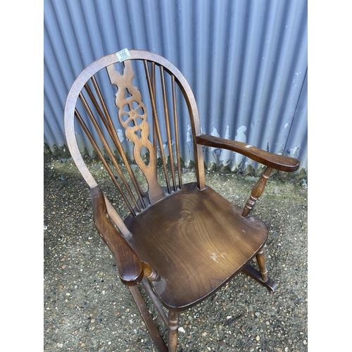 106 - A wheelback rocker chair