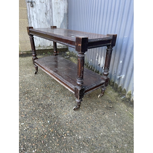 130 - An oak two tier buffet table 120x45 x70