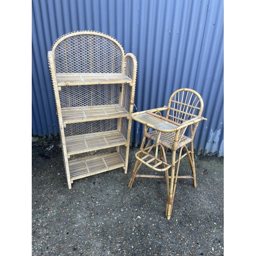 136 - A folding bamboo book shelf together with a bamboo high chair