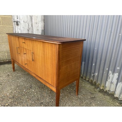 156 - A mid century teak sideboard