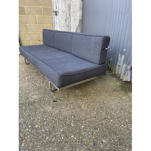 160 - A LE CORBUSIER LC5 style chrome and grey upholstered sofa