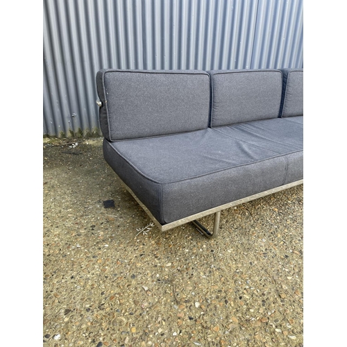 160 - A LE CORBUSIER LC5 style chrome and grey upholstered sofa