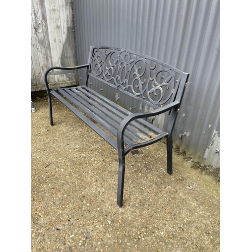 179 - A black metal garden bench