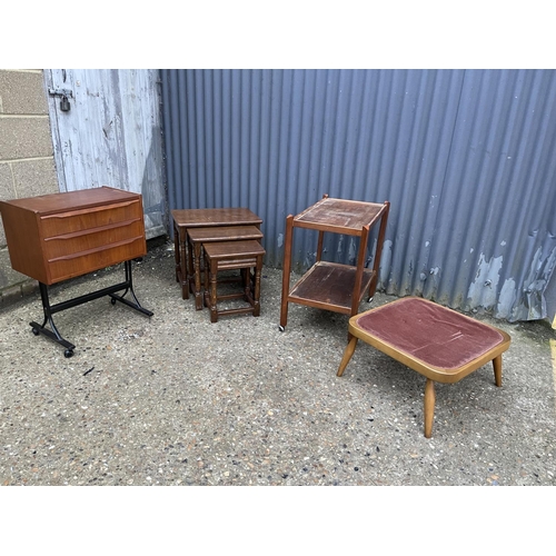 186 - Teak chest of three, nest of three, teak trolley, and ercol stool