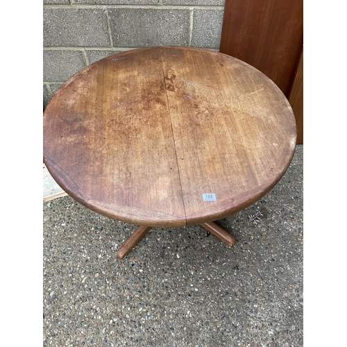 188 - A danish teak extending dining table with two leaves