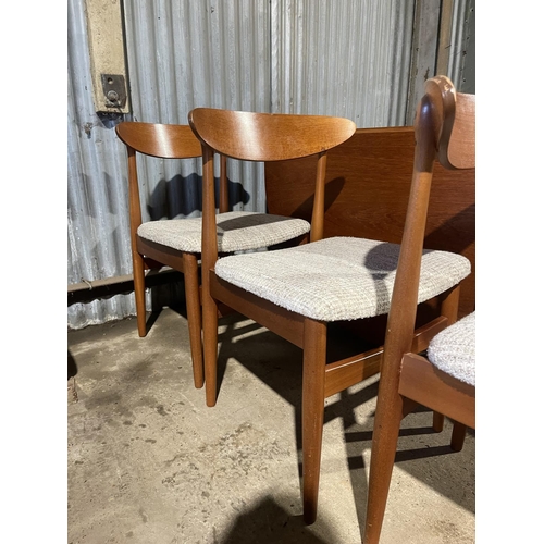 196 - A mid century teak gate-leg dining table together with a set of six matching teak chairs