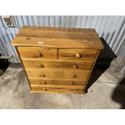 202 - A solid pine chest of six drawers