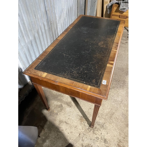 210 - A reproduction yew wood three drawer writing table with brown leather top 140 x 70x 74