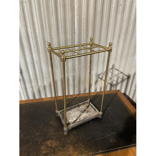 211 - A brass and iron umbrella stand