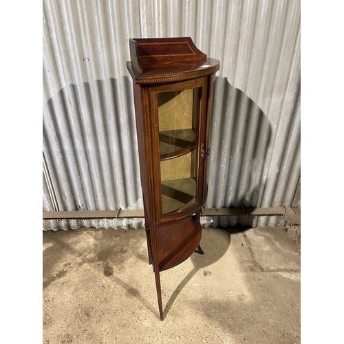 213 - An Edwardian inlaid mahogany glazed bow fronted cabinet