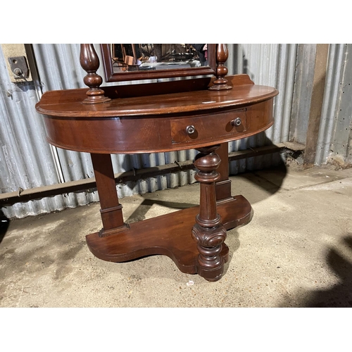 214 - A victorian bow fronted dressing table with swing mirror