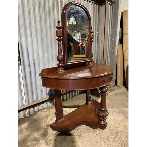 214 - A victorian bow fronted dressing table with swing mirror