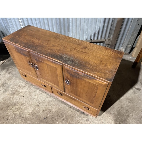 217 - A ercol light elm sideboard for restoration