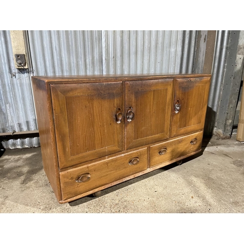 217 - A ercol light elm sideboard for restoration