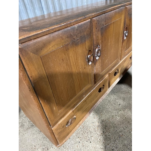 217 - A ercol light elm sideboard for restoration