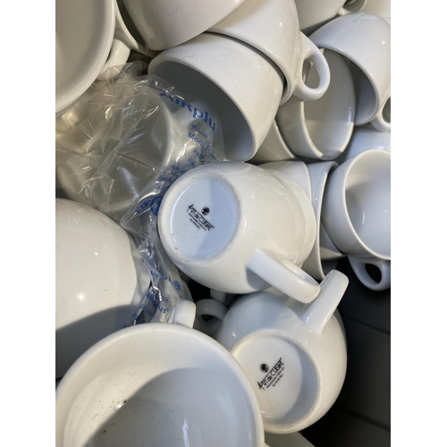 222 - A large crate containing arte de cuisine white china cups, saucers and plates