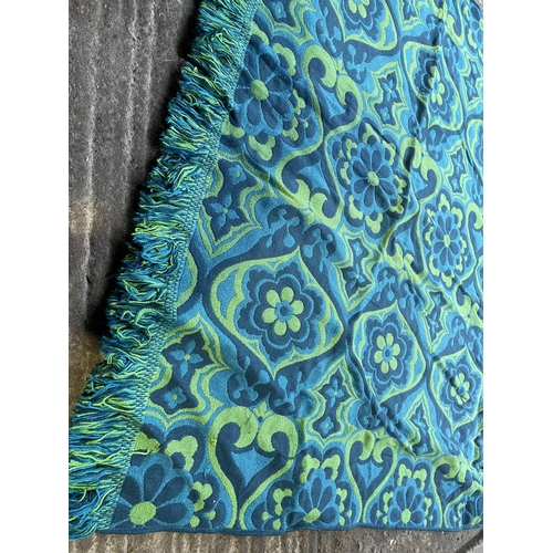 228 - A retro blue and green pattern rug sixe 6' x 8 '