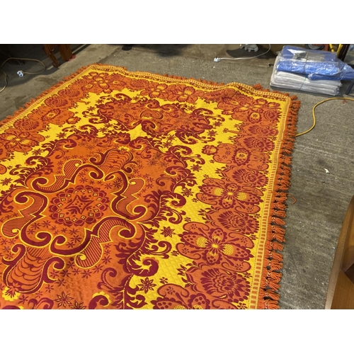 229 - A bright red and yellow pattern rug 300x190