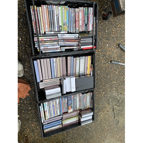 254 - Three trays of assorted DVDS