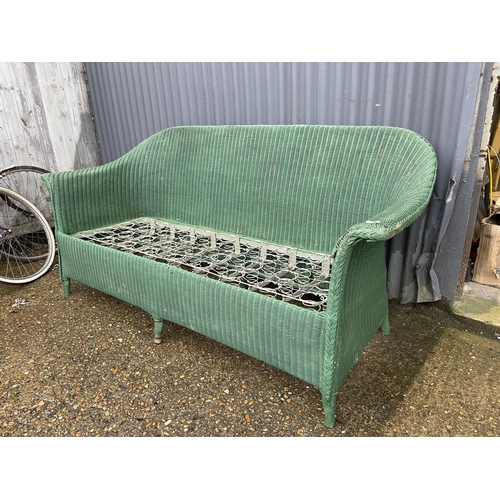 257 - A green lloyd loom sofa