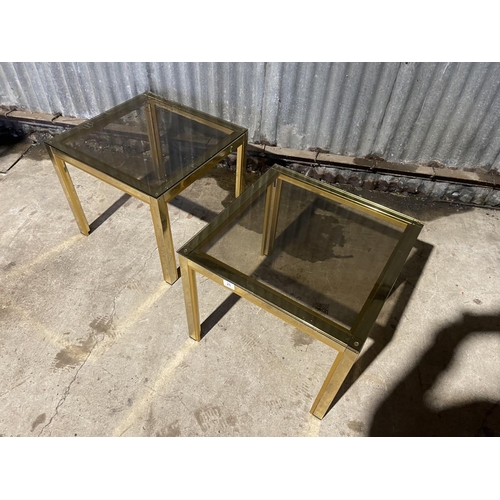 26 - A pair of Italian style brass lamp tables with smoked glass tops 50x50 x50