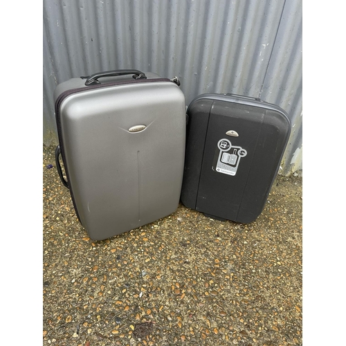 260 - Two modern wheelie suit cases