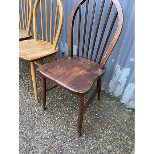 264 - Three ercol stick back chairs