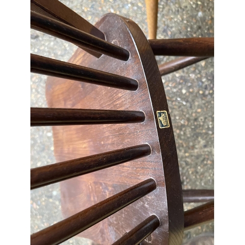 264 - Three ercol stick back chairs