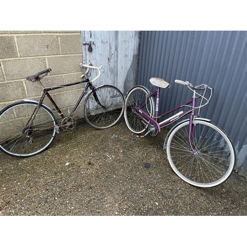 275 - A Raleigh ladies cycle together with another vintage bike