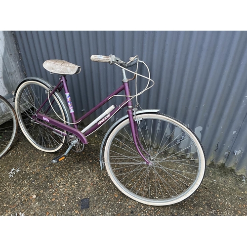 275 - A Raleigh ladies cycle together with another vintage bike