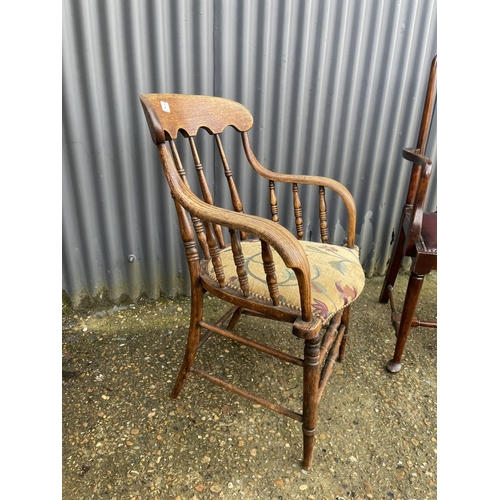 3 - An oak desk chair together with another carver