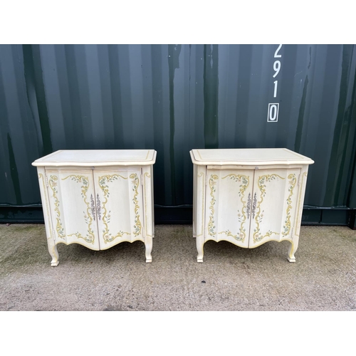 304 - A pair of hand painted bedside cupboards with slide 64x54x60