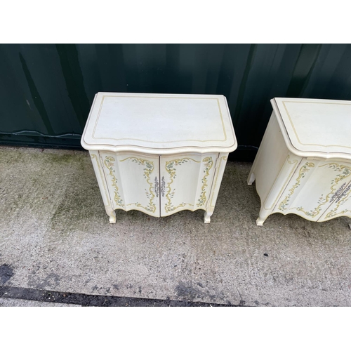 304 - A pair of hand painted bedside cupboards with slide 64x54x60