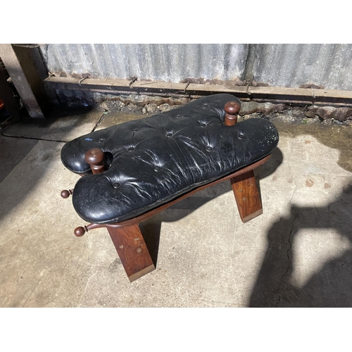 31 - A hardwood brass inlaid camel stool