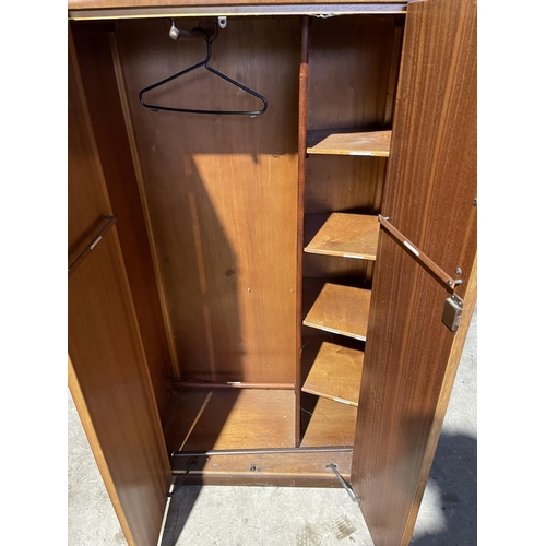 33 - An Art Deco style two door wardrobe 88x50x160